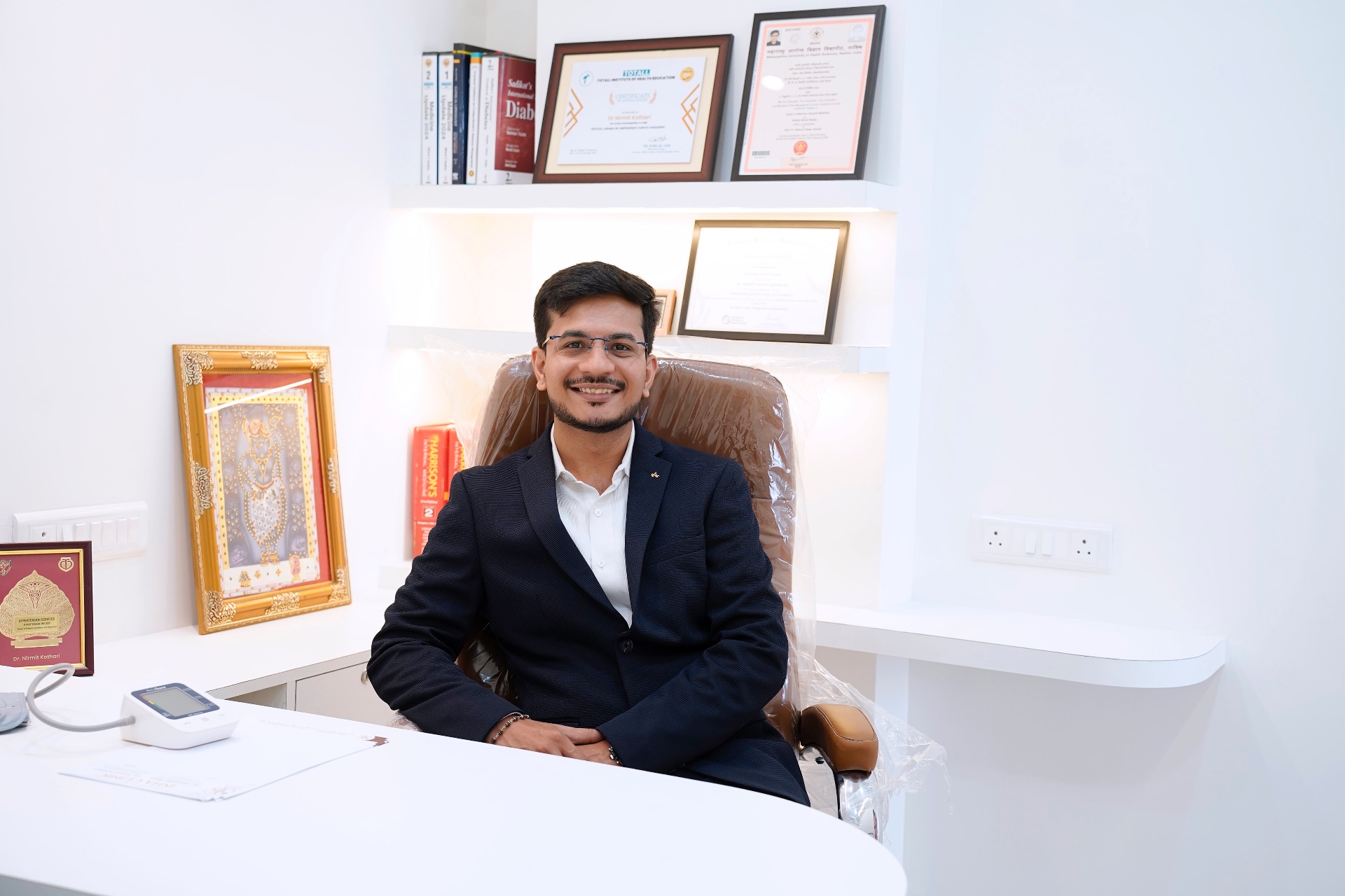 Dr. Nirmit Kothari
